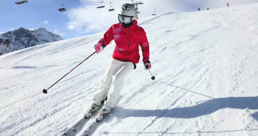 Photo of woman on a ski slope. She