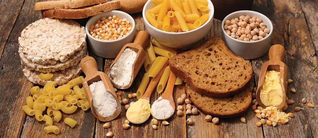 Photo of some gluten-free products such as bread, flour, pasta and grains