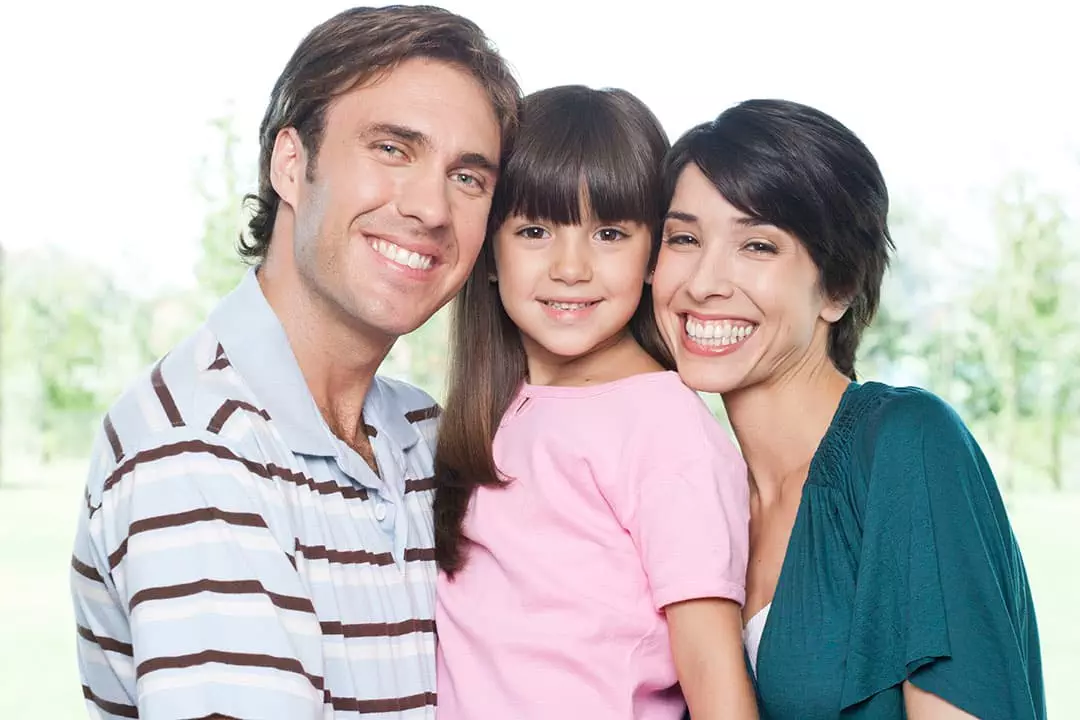photo of an hispanic family mother, father and daughter