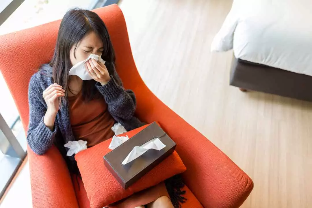 Woman feeling sick at home. She