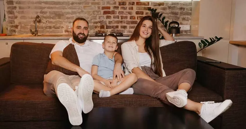 Photo of hispanic family on couch