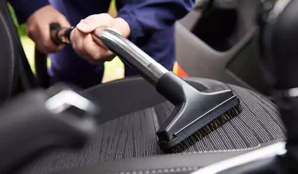 Photo of vacuuming Seat Of Car During