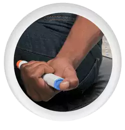 Photo icon of person injecting themselves with an epipen