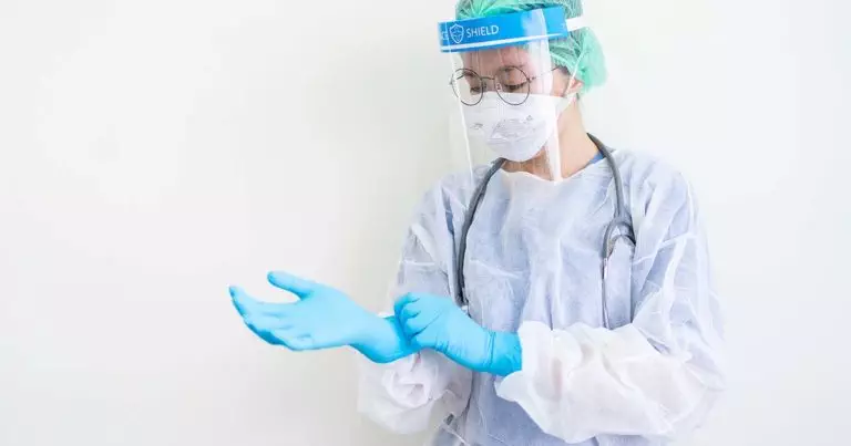 Photo of Medical professional wearing PPE