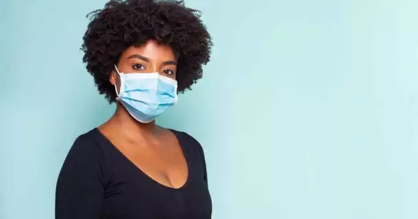 Photo of black woman wearing a facemask